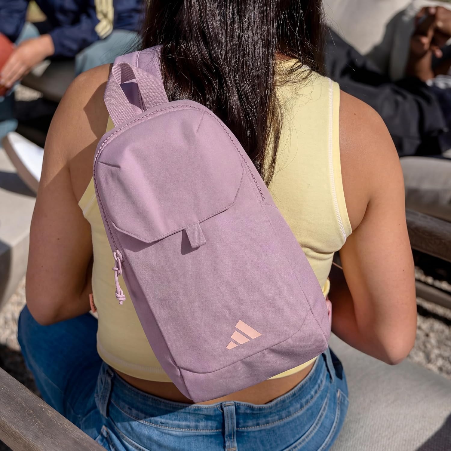 image:imageadidas Essentials Sling Bag Adjustable Strap Secure Zip Pockets Wears Crossbody Phone Strap Pocket Locks In Essentials Everyday amp Travel ReadyMagic Mauve PurpleRose Gold3